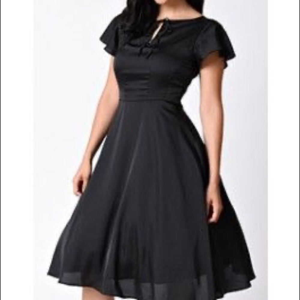 Black 1940s style flutter sleeve “Formosa” dress